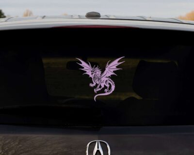 Silhouette of a fierce looking dragon with wings spread