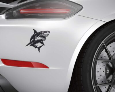 Great white shark decal featuring a shark with a powerful body, jaws slightly open to reveal rows of razor-sharp, menacing teeth ready to strike.