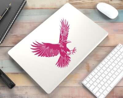 Striking black silhouette vinyl decal of a raven in mid-flight, wings spread wide and talons extended.