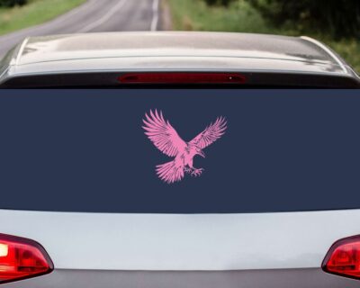 Striking black silhouette vinyl decal of a raven in mid-flight, wings spread wide and talons extended.