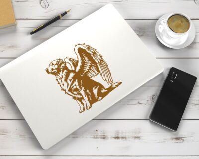 Vinyl decal of a majestic golden retriever dog with large angel wings. The dog is depicted sitting upright with a calm and serene expression, its head slightly tilted upward as if looking toward the heavens. Detailed fur markings create a textured, realistic look throughout the body, while the strong wings extend gracefully from its back, showcasing layered feathers with intricate line work.