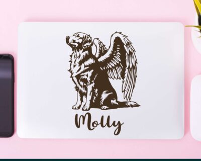 Vinyl decal of a majestic golden retriever dog with large angel wings. The dog is depicted sitting upright with a calm and serene expression, its head slightly tilted upward as if looking toward the heavens. Detailed fur markings create a textured, realistic look throughout the body, while the strong wings extend gracefully from its back, showcasing layered feathers with intricate line work.